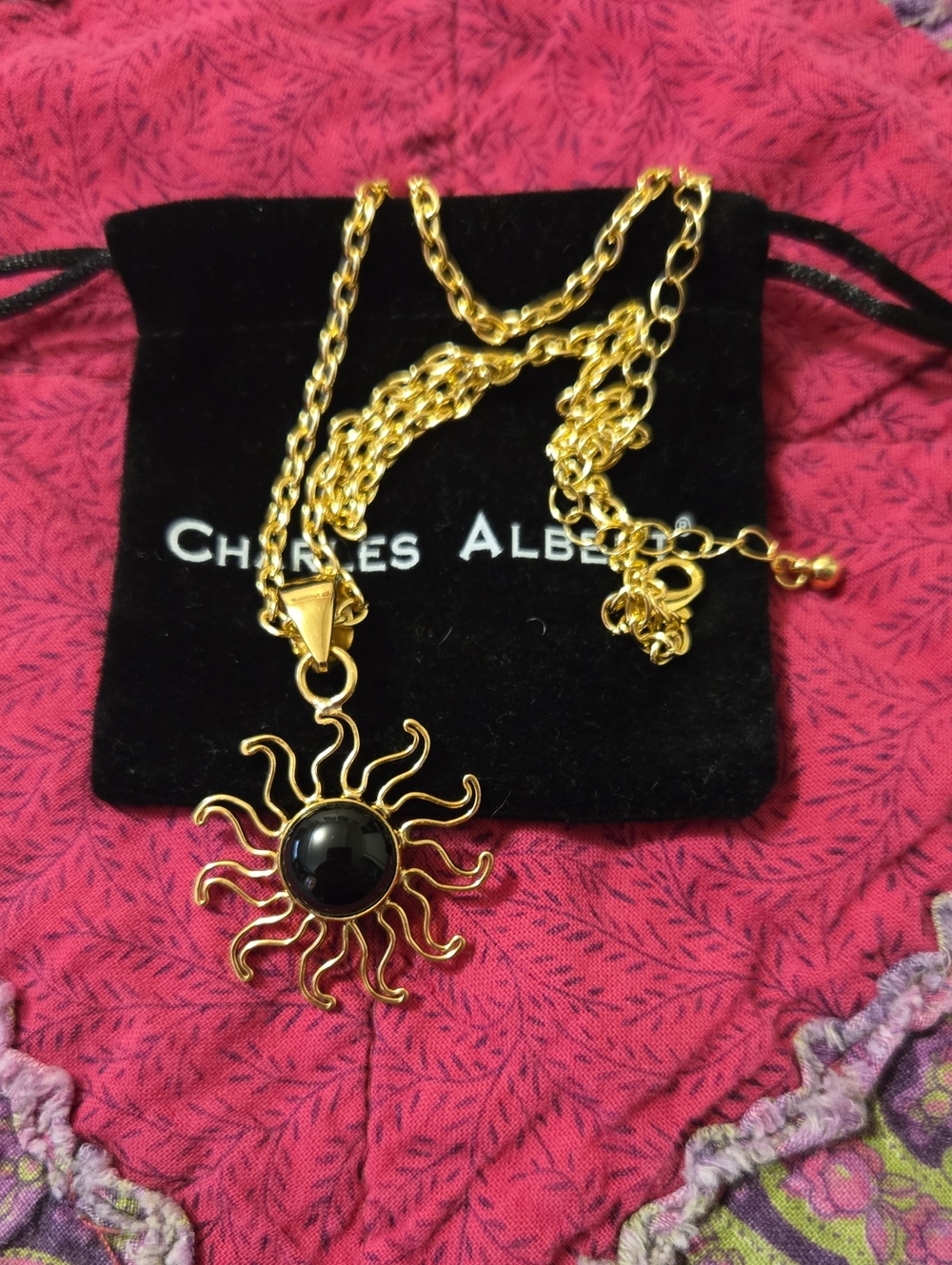 Charles Albert Gold Sunburst Necklace with Black Cabochon